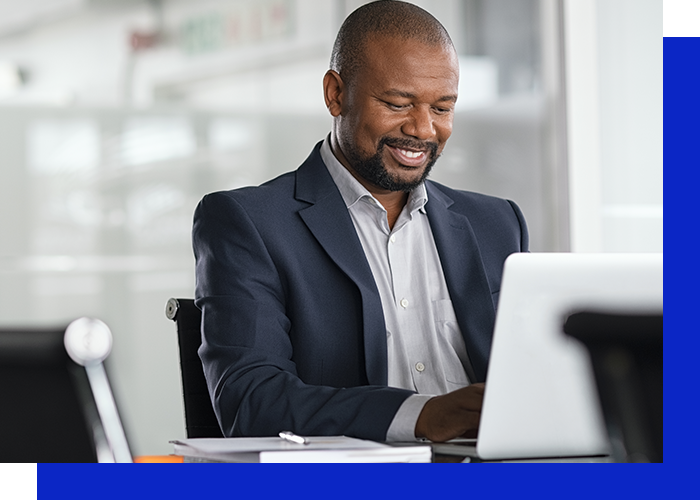 image of a man using a laptop